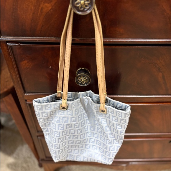 Fendi Handbags - Fendi Light Blue FF Monogram Tote with Tan Leather Straps.